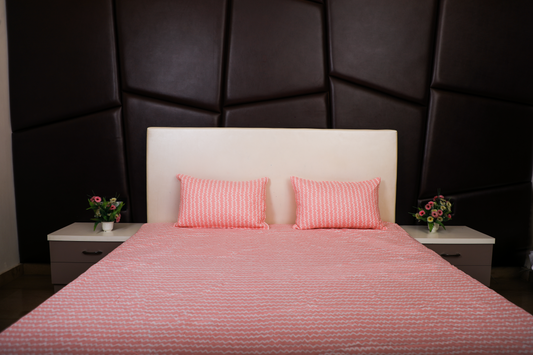 Anthurium- DOUBLE BED BEDSHEET WITH QUILTED PILLOW COVER ( Pink colour)
