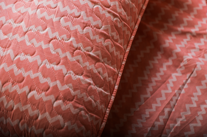Anthurium- DOUBLE BED BEDSHEET WITH QUILTED PILLOW COVER ( Pink colour)