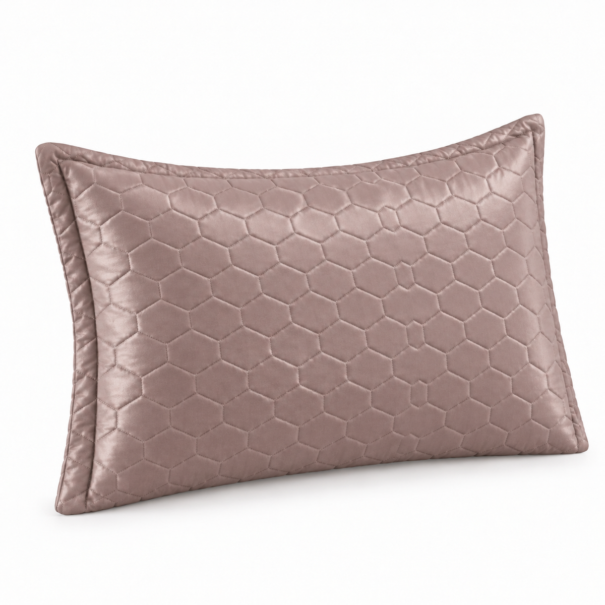 A rectangular lumbar pillow in a dusty rose color with a textured honeycomb pattern, shown on a plain white background.